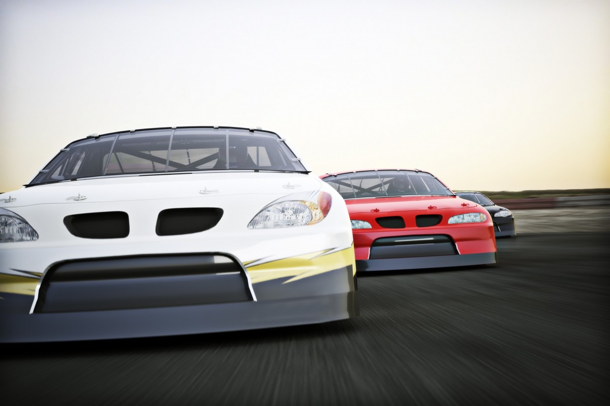 two racecars on a track